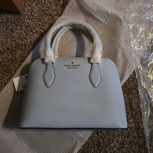 Brand new with tags, light blue Kate Spade, smoke free home.